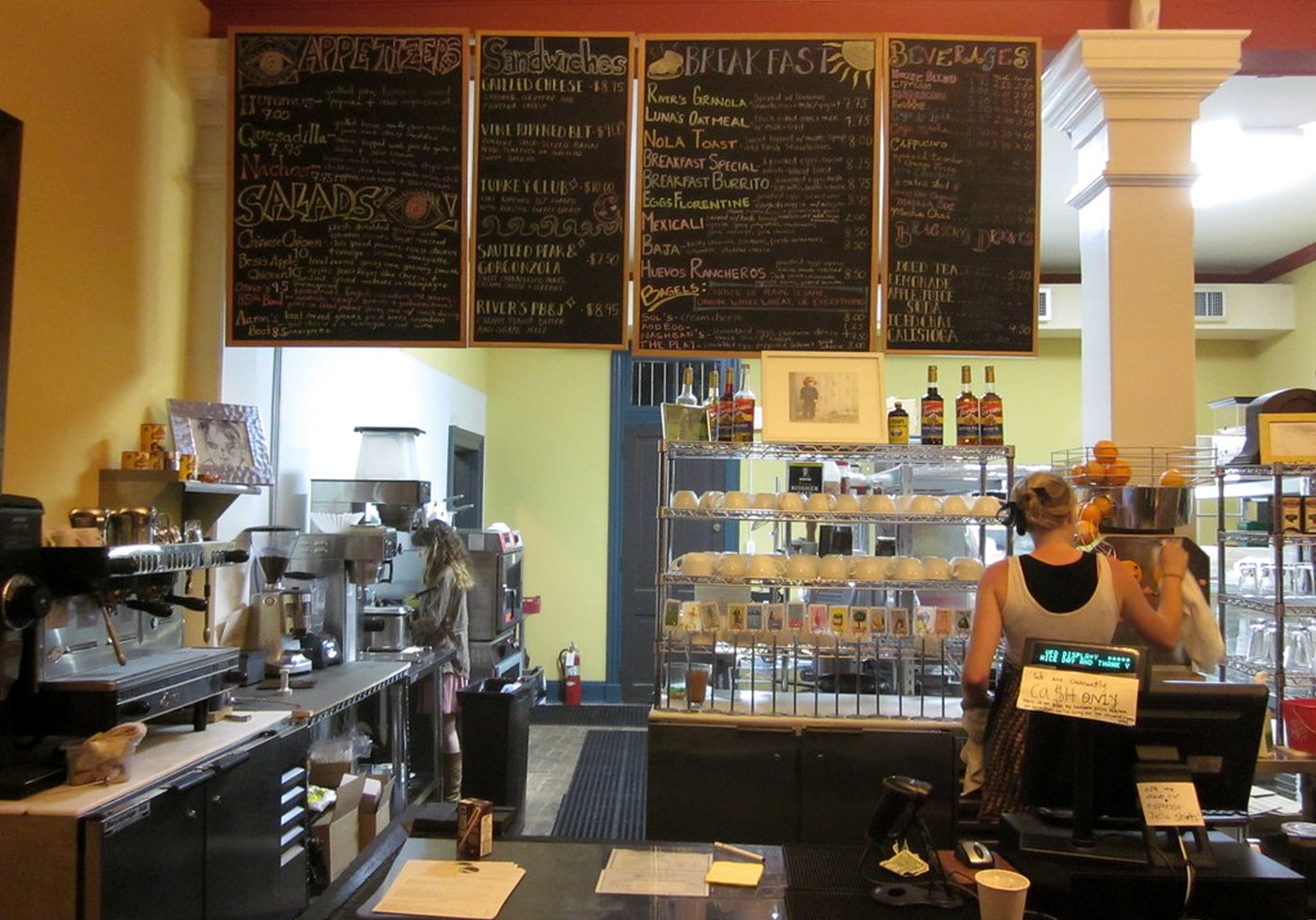 Cafe counter with multiple chalkboard menu panels